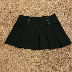 black mini pleated skirt